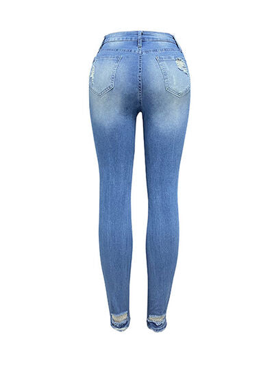 Distressed Buttoned Jeans with Pockets